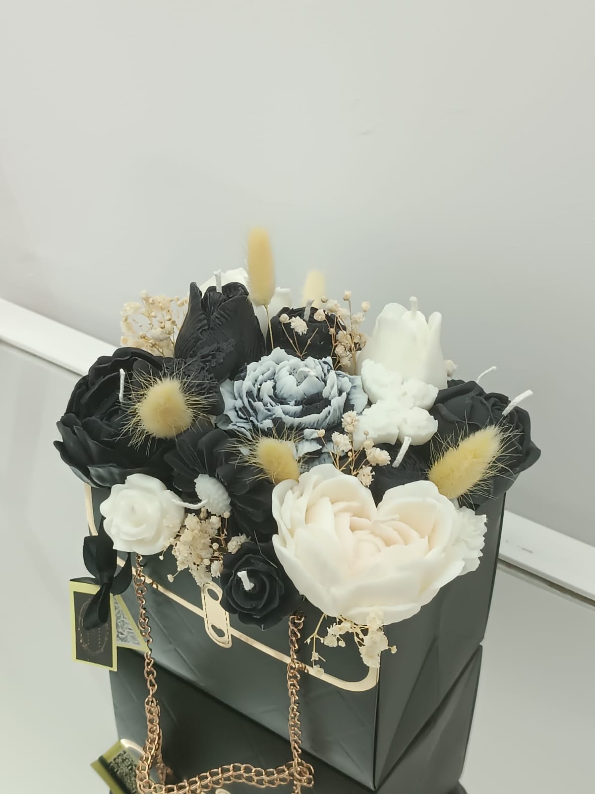 Bouquet floreale di candele profumate in borsetta 